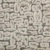 neutral spotted velvet-chenille fabric from Clarke & Clarke