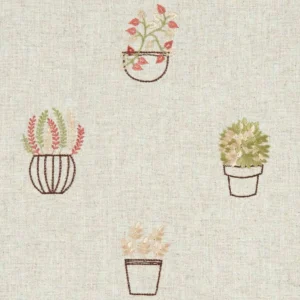 brown botanical embroideried fabric from Clarke & Clarke