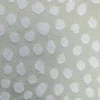 green spotted jacquard fabric from Ashley Wilde