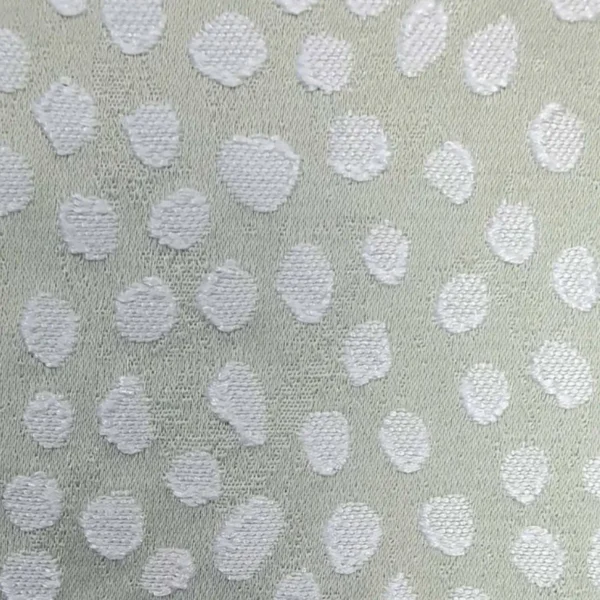 green spotted jacquard fabric from Ashley Wilde