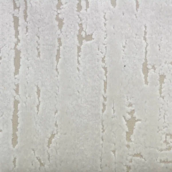 Aurora Fabric - Natural by neutral plain velvet-chenille fabric from Clarke & Clarke