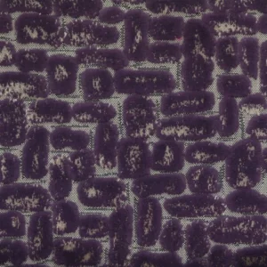 purple spotted velvet-chenille fabric from Clarke & Clarke