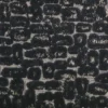 black-grey spotted velvet-chenille fabric from Clarke & Clarke
