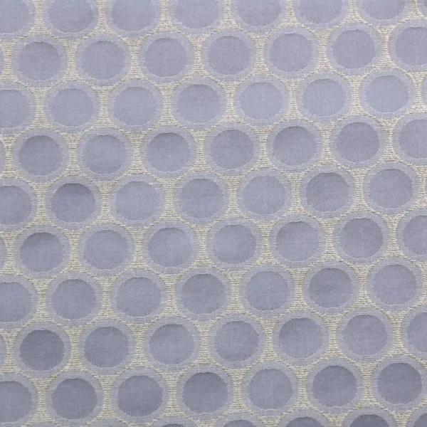 blue spotted jacquard fabric from Clarke & Clarke