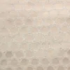 neutral spotted jacquard fabric from Clarke & Clarke