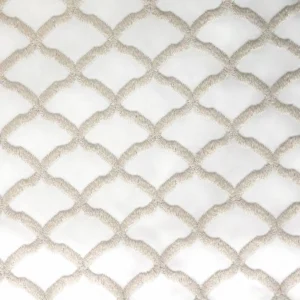 white geometric embroideried fabric from Clarke & Clarke