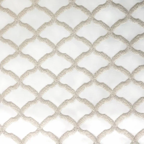 Reggio Fabric - Ivory by white geometric embroideried fabric from Clarke & Clarke