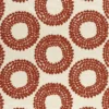 orange spotted embroideried fabric from Clarke & Clarke