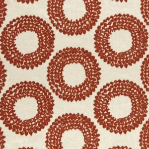 orange spotted embroideried fabric from Clarke & Clarke