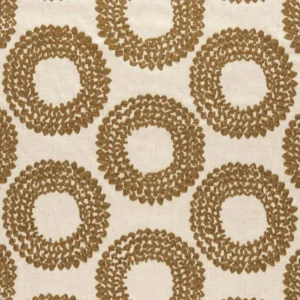 yellow spotted embroideried fabric from Clarke & Clarke