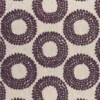 purple spotted embroideried fabric from Clarke & Clarke