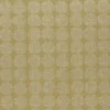 green geometric embroideried fabric from Clarke & Clarke