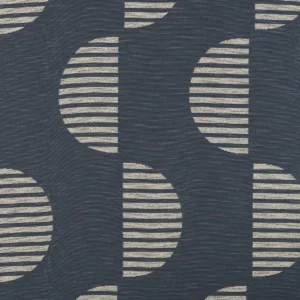 blue geometric voile-sheer fabric from Clarke & Clarke