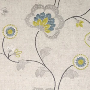 yellow botanical embroideried fabric from Clarke & Clarke