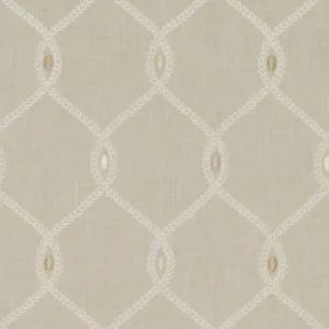 brown geometric embroideried fabric from Clarke & Clarke