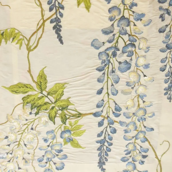 blue botanical embroideried fabric from Colefax & Fowler