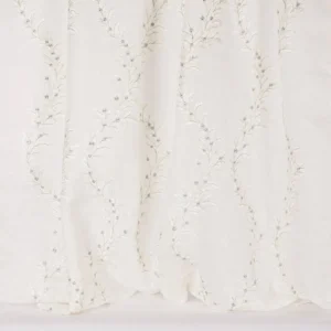 white botanical embroideried fabric from Colefax & Fowler