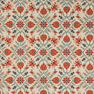 red botanical embroideried fabric from Colefax & Fowler