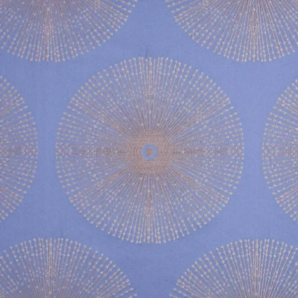 Amaze Fabric - Stone Blue by blue spotted embroideried fabric from Beaumont Textiles
