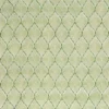 green geometric embroideried fabric from Nina Campbell