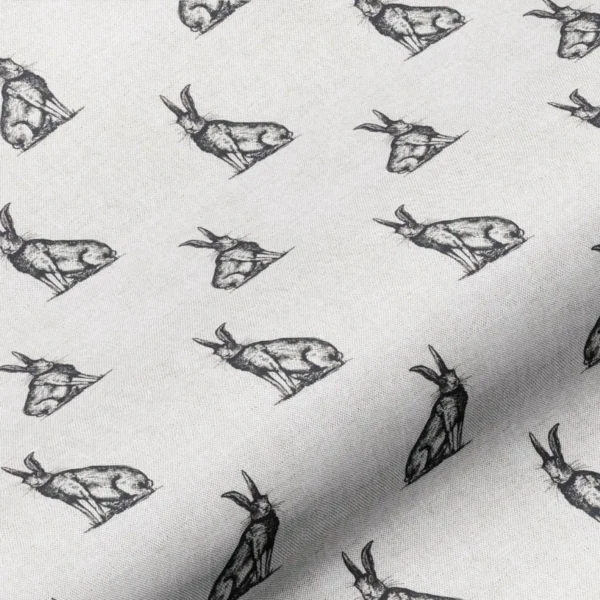 Horace Hare Fabric - Black / Natural by black-grey animal cotton fabric from Art of the Loom