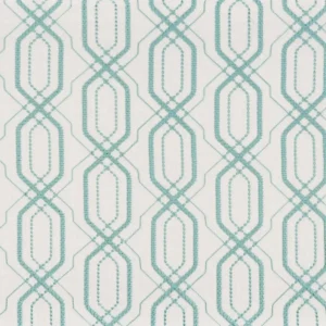green geometric embroideried fabric from Camengo