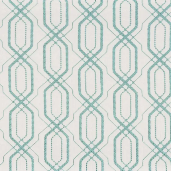 green geometric embroideried fabric from Camengo