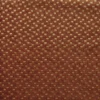 orange geometric embroideried fabric from Casamance