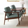 TWO BLUE WEB DESIGN CHAIRS WITH WOODEN ARM RESTS