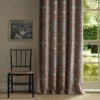red botanical curtain with cushion and sofa