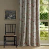 red botanical curtain with window and chair