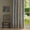 pink botanical curtain with window and chair