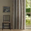 red botanical curtain with window and chair