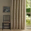 multicolour botanical curtain with window and chair