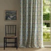 pink botanical curtain with window and chair