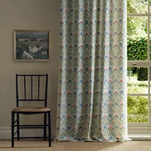 pink botanical curtain with window and chair