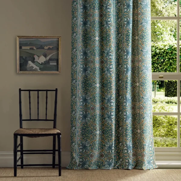 Walthamstow Fabric - Teal / Ochre by blue botanical curtain with window and chair