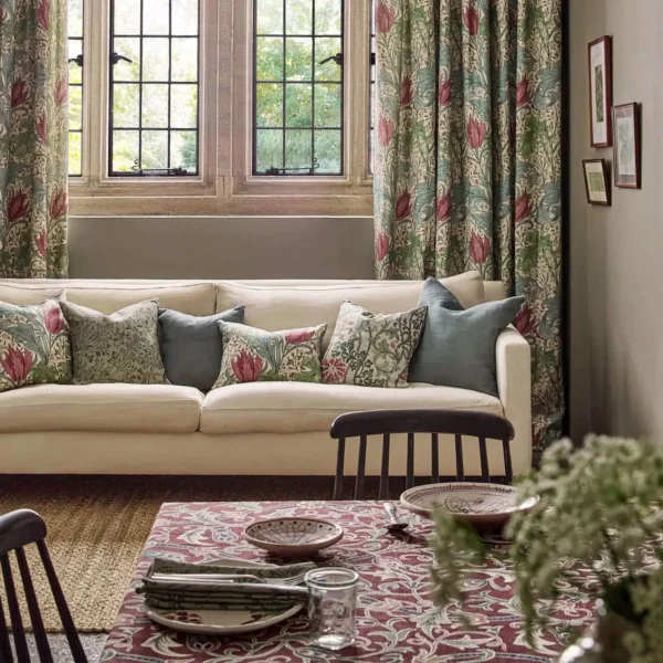 Scrolling Tulip Fabric - Plum by red botanical curtain with cushion and window