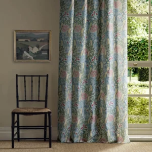 pink botanical curtain with window and chair