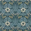 blue botanical wallpaper and wall with side table and vases
