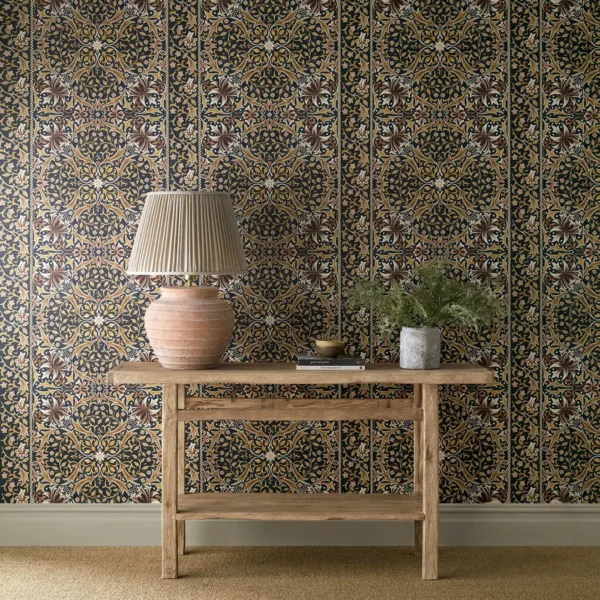 Walthamstow Wallpaper - Indigo / Gold by green botanical wallpaper and wall with side table and vases