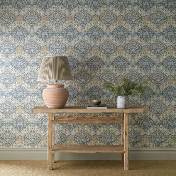 Norbury Wallpaper - Woad / Linen by blue botanical wallpaper and wall with side table and vases