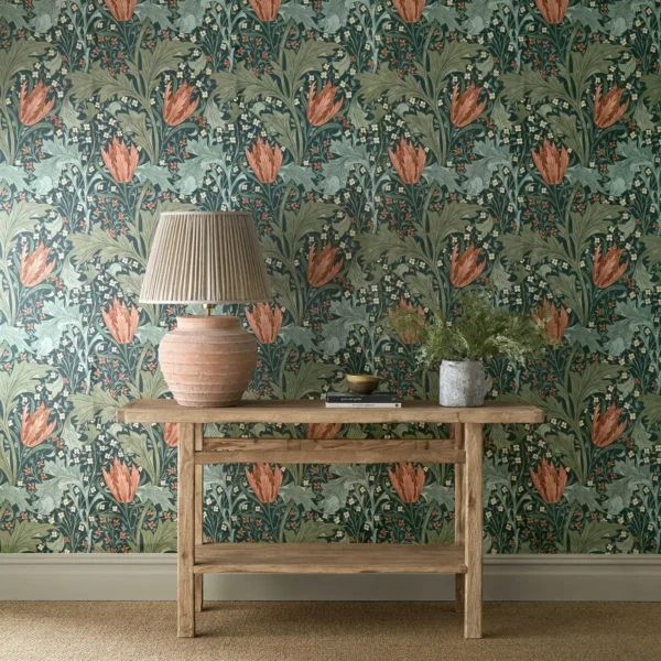green botanical wallpaper and wall with side table and vases