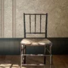 pink botanical wallpaper and wall with chair