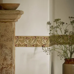 yellow botanical wallpaper and side table with door