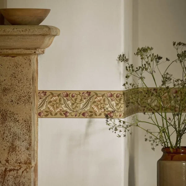 Bluebell & Peony Border - Gold / Madder by yellow botanical wallpaper and side table with door