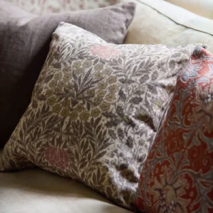 black-grey botanical cushion with sofa