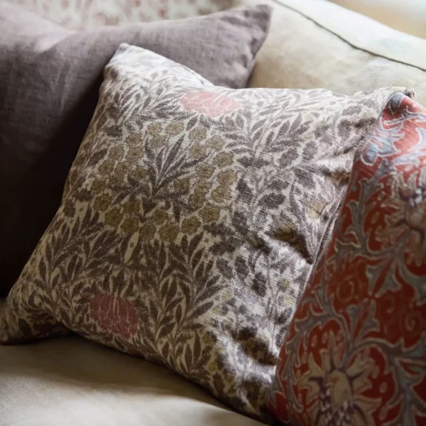 black-grey botanical cushion with sofa