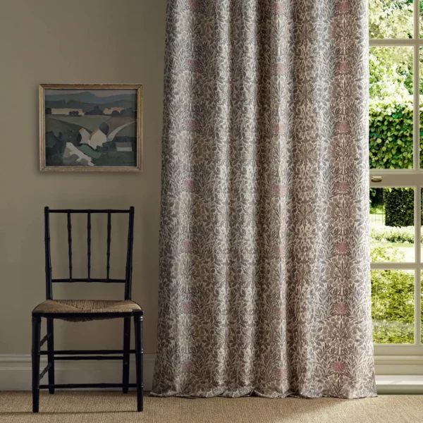 black-grey botanical curtain with chair and window