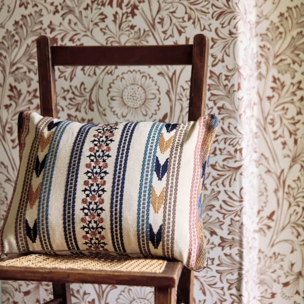 Bloomsbury Stripe Fabric - Russet / Indigo by multicolour striped cushion with chair and wall